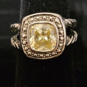 Beautiful silver colored ring with bling! Shiny square cut light gold gem